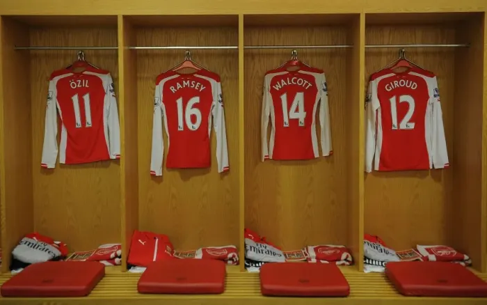 Framed Print : Arsenal Changing Room: Ozil, Ramsey, Walcott, Giroud Prepare for Arsenal v Stoke City (2014-15)