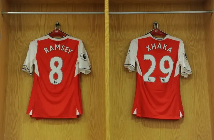Framed Print : Arsenal Changing Room: Ramsey and Xhaka Jerseys Ready for Arsenal v Everton Clash (2016-17)