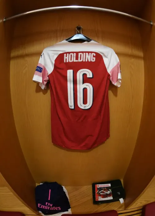 Framed Print : Arsenal Changing Room: Rob Holding's Jersey Awaits before Arsenal vs Sporting CP, UEFA Europa League