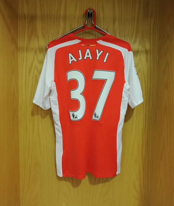 Framed Print : Arsenal Changing Room: Semi Ajayi Prepares for Arsenal v Hull City (2014-15) Framed Print : Arsenal Changing Room: Semi Ajayi Prepares for Arsenal v Hull City (2014-15)