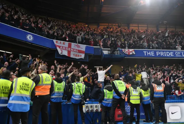 Framed Print : Arsenal Clinch Premier League Title at Stamford Bridge: Euphoric Fans Rejoice Over Chelsea Victory Framed Print : Arsenal Clinch Premier League Title at Stamford Bridge: Euphoric Fans Rejoice Over Chelsea Victory