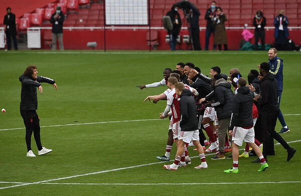 Arsenal Clinch Premier League Victory: David Luiz and Team Celebrate Historic Win Over Brighton & Hove Albion
