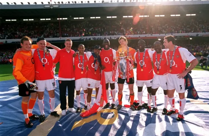 Framed Print : The Arsenal defenders and goalkeepers celebrate with the Premiership trophy Framed Print : The Arsenal defenders and goalkeepers celebrate with the Premiership trophy
