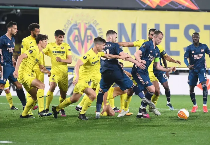 Framed Print : Arsenal Defenders Hold Off Villarreal in Empty Europa League Semi-Final Framed Print : Arsenal Defenders Hold Off Villarreal in Empty Europa League Semi-Final