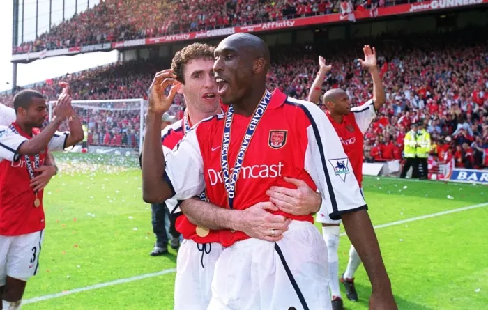 Framed Print : Arsenal defenders Martin Keown and Sol Campbell celebrate after the match Framed Print : Arsenal defenders Martin Keown and Sol Campbell celebrate after the match