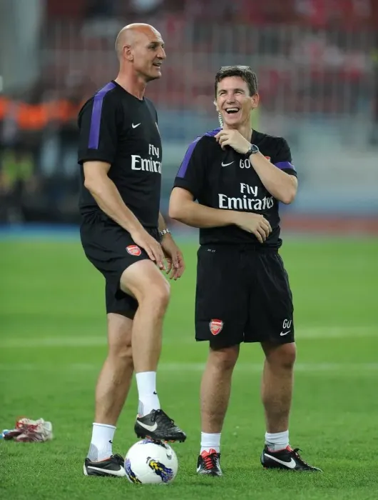Framed Print : Arsenal Doctor Gary O Driscoll shares a joke with Steve Bould Arsenal Assistant Manager