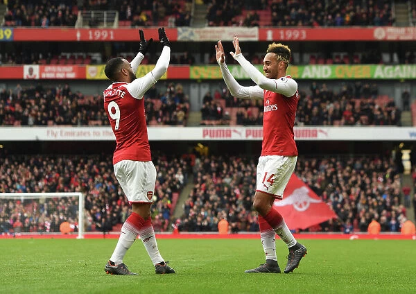 Arsenal Double Trouble: Aubameyang and Lacazette Celebrate Goals Against Stoke City
