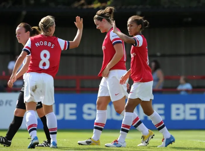 Framed Print : Arsenal Double: Yankey and Nobbs Celebrate Goals in FA WSL Match