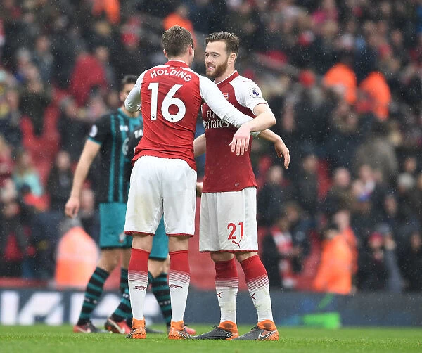Arsenal Duo: Holding and Chambers Share a Moment after Arsenal vs Southampton Match