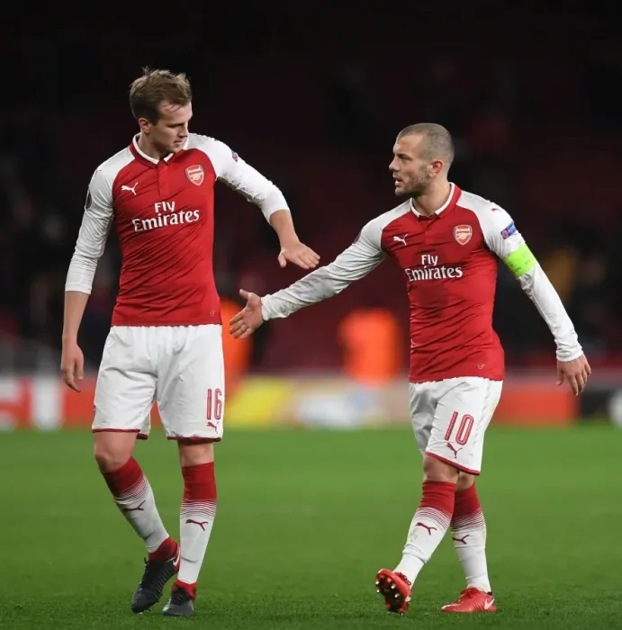 Framed Print : Arsenal Duo Jack Wilshere and Rob Holding Celebrate Victory Over BATE Borisov