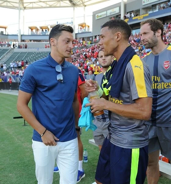 Arsenal Duo Mesut Ozil and Kieran Gibbs in Pre-Match Conversation: Arsenal vs. Chivas, 2016-17