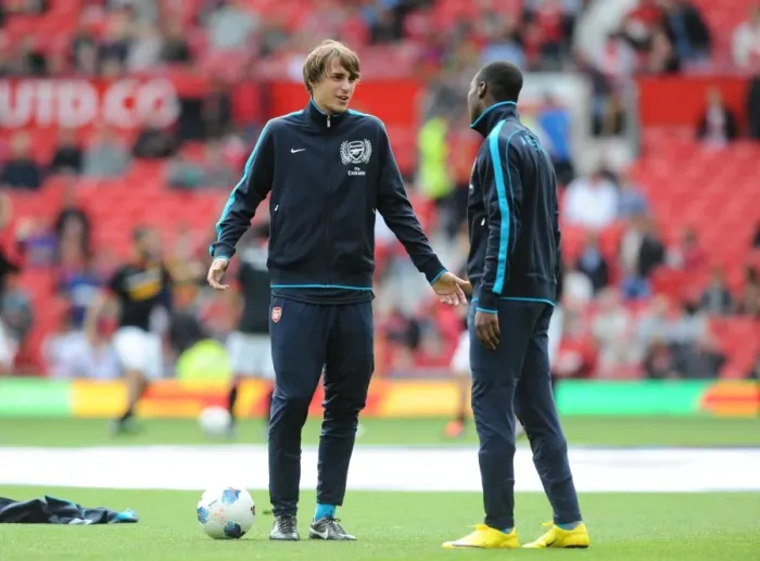 Framed Print : Arsenal Duo Prepare for Manchester United Clash in 2011-12 Premier League Framed Print : Arsenal Duo Prepare for Manchester United Clash in 2011-12 Premier League