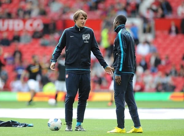 Arsenal Duo Prepare for Manchester United Clash in 2011-12 Premier League