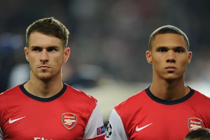 Framed Print : Arsenal Duo: Ramsey and Gibbs Prepare for Napoli Clash in 2013-14 Champions League