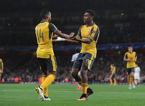 Arsenal Duo Theo Walcott and Alex Iwobi Celebrate Goals Against FC Basel in 2016-17 Champions League