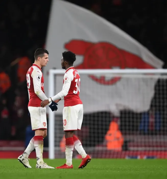 Framed Print : Arsenal Duo: Xhaka and Maitland-Niles Share a Moment after Arsenal vs Newcastle United (2017-18)