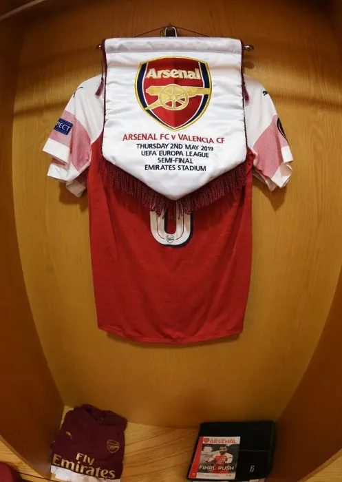 Framed Print : Arsenal Europa League Semi-Final: Match Pennant in Changing Room before Arsenal vs Valencia (2018-19) Framed Print : Arsenal Europa League Semi-Final: Match Pennant in Changing Room before Arsenal vs Valencia (2018-19)