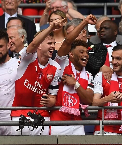 Arsenal FA Cup Victory: Holding and Oxlade-Chamberlain's Triumphant Embrace
