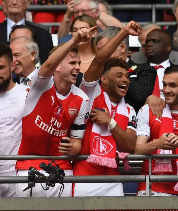 Framed Print : Arsenal FA Cup Victory: Holding and Oxlade-Chamberlain's Triumphant Embrace Framed Print : Arsenal FA Cup Victory: Holding and Oxlade-Chamberlain's Triumphant Embrace