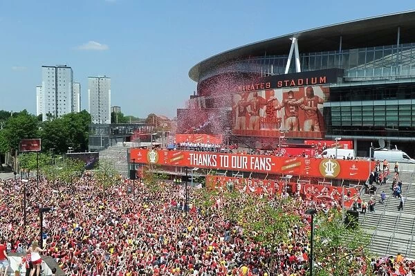 Arsenal FA Cup Victory Parade: Celebrating with the Trophy at Emirates Stadium (2014)