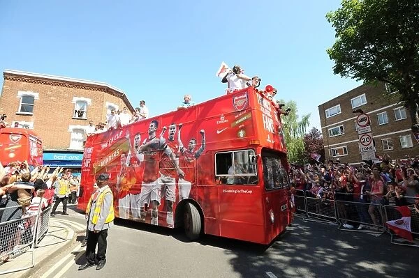Arsenal FA Cup Victory Parade: Celebrating with the Trophy in London, 2014