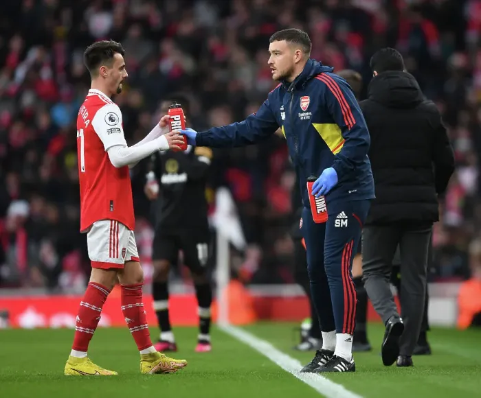 Framed Print : Arsenal: Fabio Vieira Receives Treatment from Physio Simon Murphy vs AFC Bournemouth, Premier League 2022-23