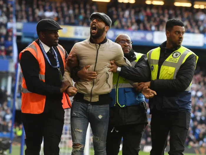 Framed Print : Arsenal Fan Removed from Chelsea vs. Arsenal Match, Premier League 2017-18