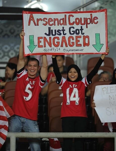 Arsenal Fans in Action during Malaysia XI vs Arsenal Pre-Season Match, 2012