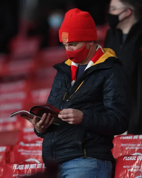Framed Print : Arsenal Fan's Anticipation: Arsenal v Burnley, Premier League, Emirates Stadium