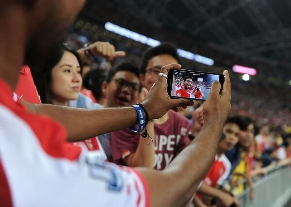 Arsenal Fans at Asia Trophy: Selfie Moment during Arsenal vs. Everton Match, Singapore 2015