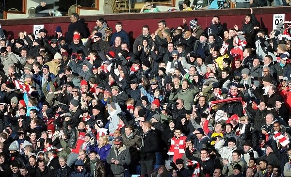 Arsenal fans celebrate the 2nd goal. Aston Villa 2: 4 Arsenal. Barclays Premier League