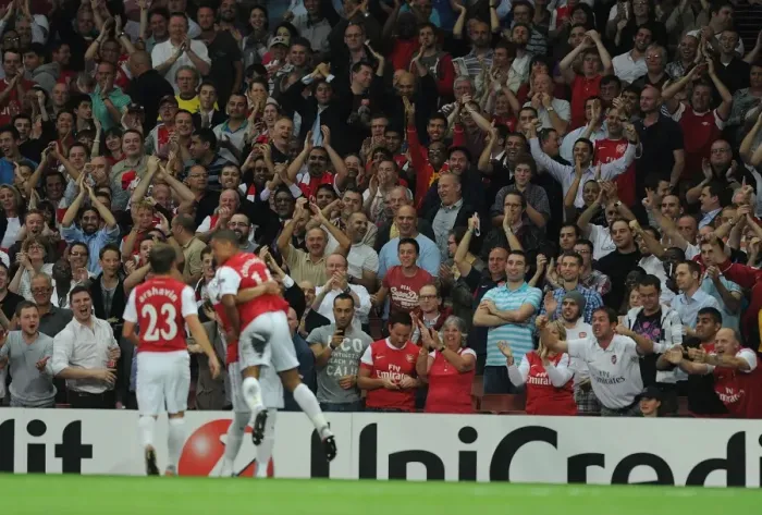 Framed Print : Arsenal Fans Celebrate Alex Oxlade-Chamberlain's Goal vs Olympiacos (2011-12)