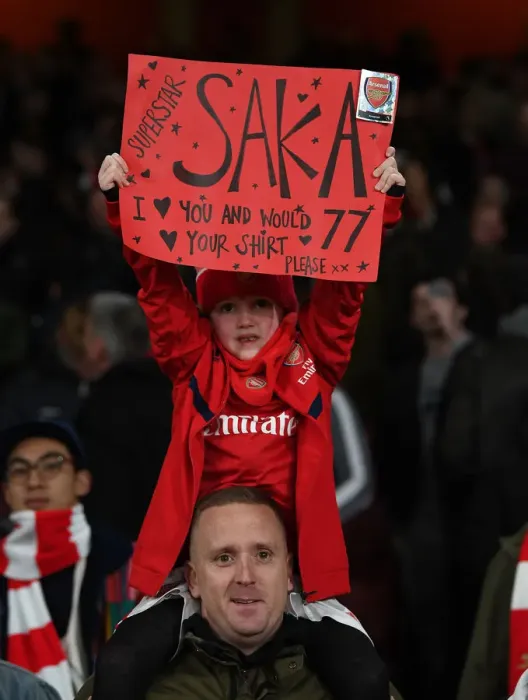 Framed Print : Arsenal Fans Celebrate with Bukayo Saka Poster after Arsenal vs. Everton Match, Premier League 2019-2020