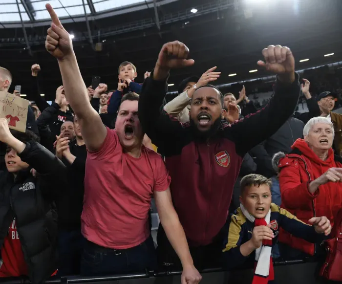 Framed Print : Arsenal Fans Celebrate Dramatic Win Against West Ham United in Premier League Showdown Framed Print : Arsenal Fans Celebrate Dramatic Win Against West Ham United in Premier League Showdown