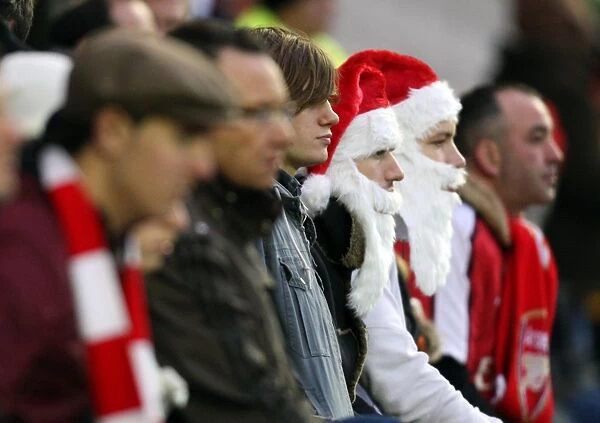 Arsenal fans dressed as Father Christmas