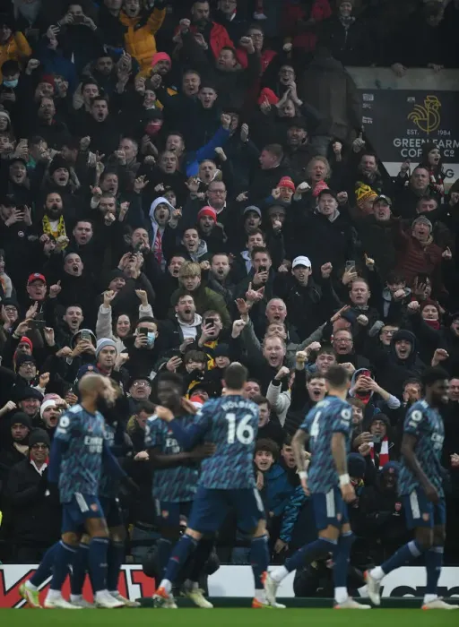 Framed Print : Arsenal Fans Euphoria: First Goal vs. Norwich City in Premier League