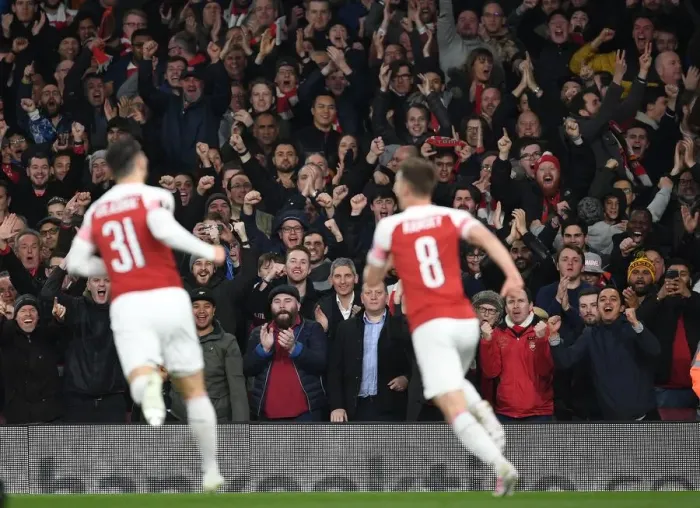 Framed Print : Arsenal Fans Euphoria: Goal Celebration vs. S.S.C. Napoli in Europa League Quarterfinal