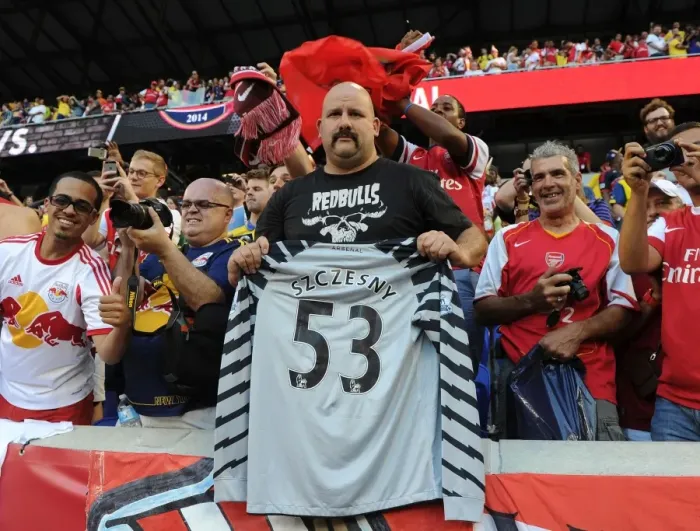 Framed Print : Arsenal Fan's Excitement: Wojciech Szczesny Jersey Signing at New York Red Bulls Match