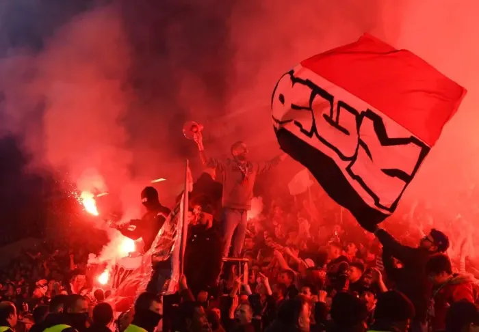 Framed Print : Arsenal Fans Face Off Against Rennes Supporters in Europa League Clash