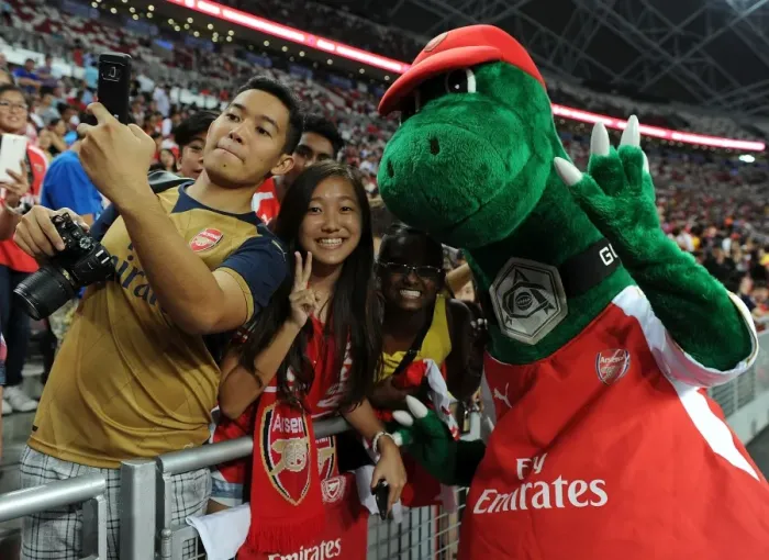 Framed Print : Arsenal Fans and Gunnersaurus Unite Before Arsenal vs. Singapore XI Match