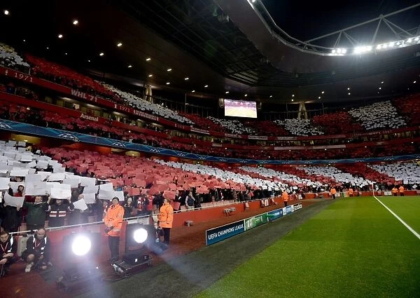 Arsenal fans hold up cards before the match. Arsenal 0: 2 Bayern Munich. UEFA Champions League