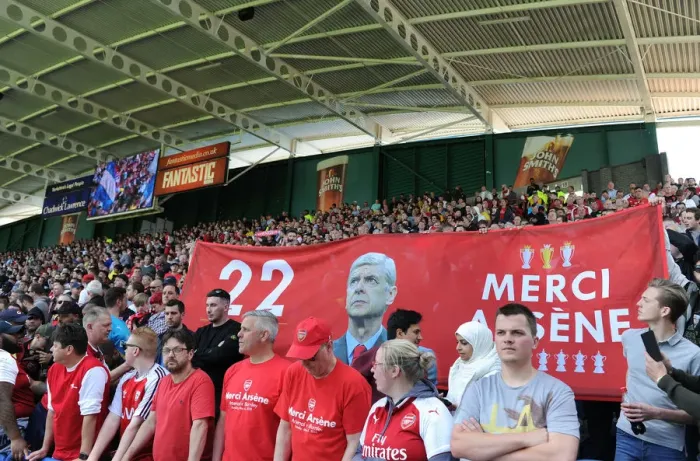 Framed Print : Arsenal Fans Honor Arsene Wenger with Banners at Huddersfield Match