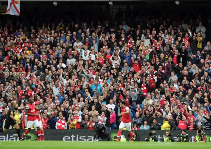Framed Print : Arsenal fans. Manchester City 1: 1 Arsenal. Barclays Premier League. Etihad Stadium Framed Print : Arsenal fans. Manchester City 1: 1 Arsenal. Barclays Premier League. Etihad Stadium