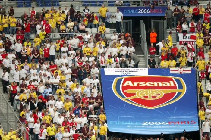 Framed Print : Arsenal fans near a giant Arsenal crest Framed Print : Arsenal fans near a giant Arsenal crest