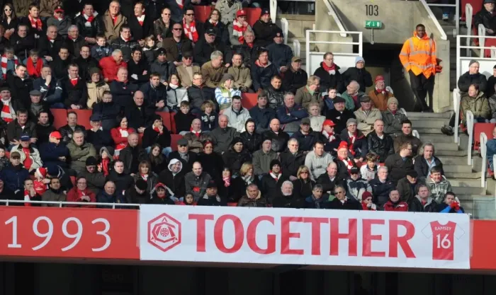 Framed Print : Arsenal Fans Rally Behind Injured Aaron Ramsey Amidst Arsenal's 3:1 Victory Over Burnley