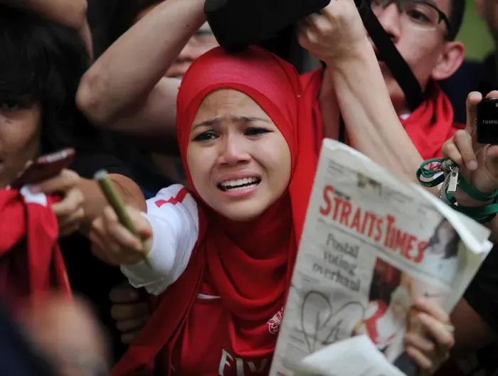 Framed Print : Arsenal Fans Rally at Suajuna Hotel, Kuala Lumpur, 2011