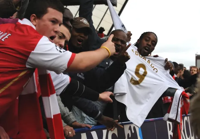 Framed Print : Arsenal fans show their respect for injured Arsenal striker Eduardo Framed Print : Arsenal fans show their respect for injured Arsenal striker Eduardo