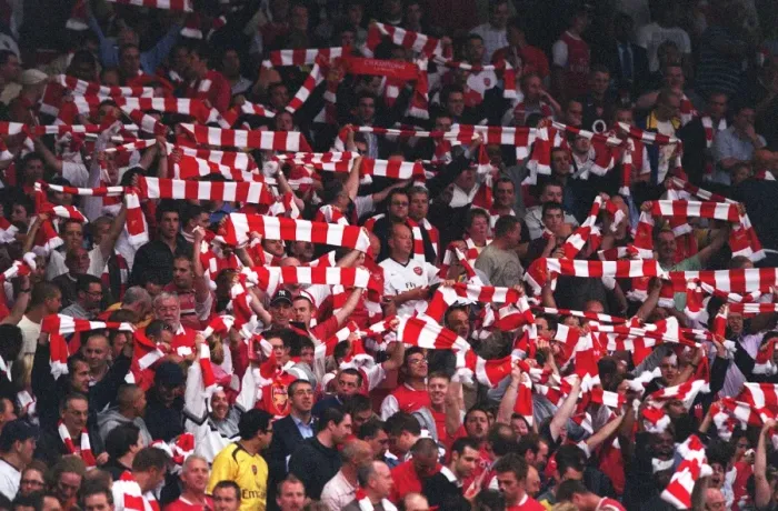 Framed Print : Arsenal fans with their scarves