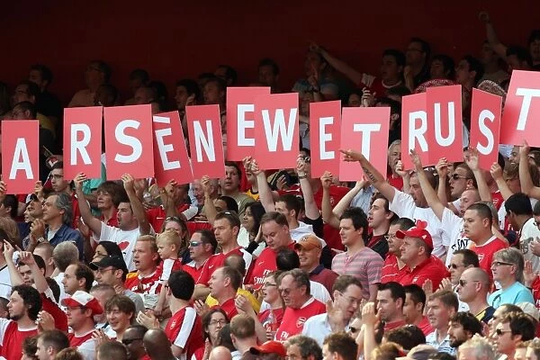 Arsenal fans show their support for the Manager