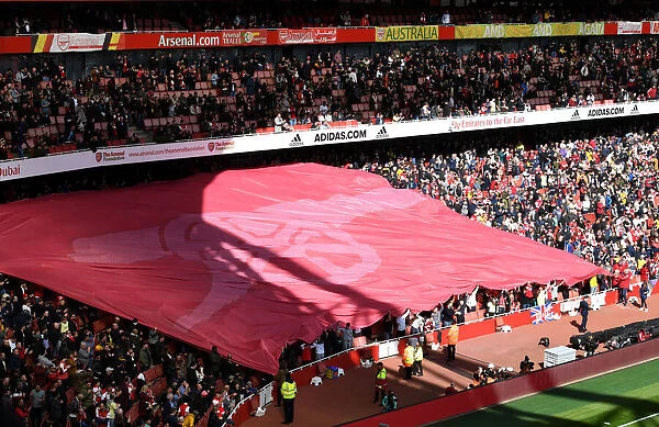 Arsenal Fans Unite: Cannon Banner at Emirates Stadium